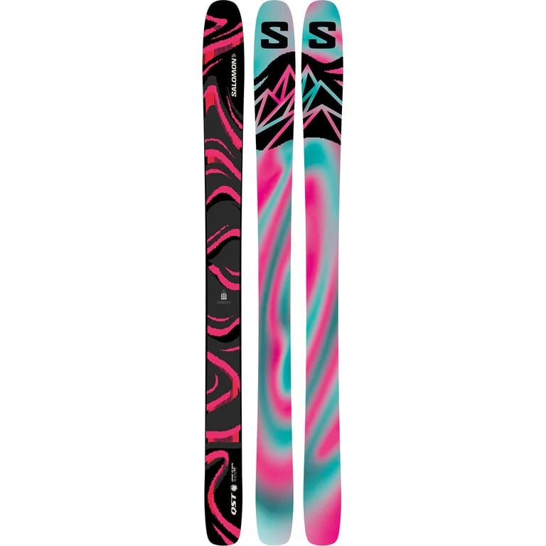 Colorful Salomon QST skis with a black and pink design on a white background