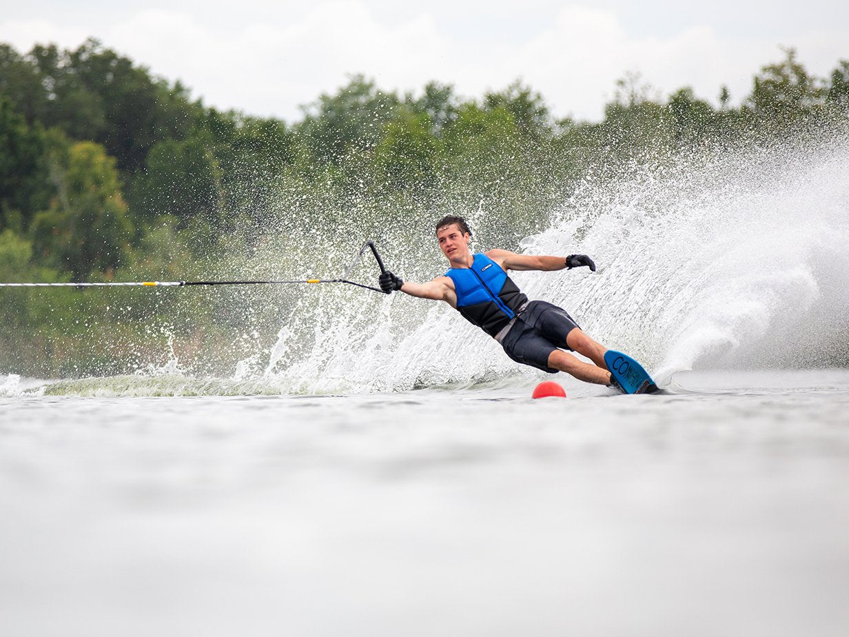 Skier rounding bouy on Connelly V water ski